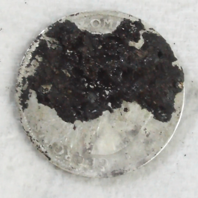 The Bad Side (Reverse) of the coin in round second of the ultrasonic coin cleaning process